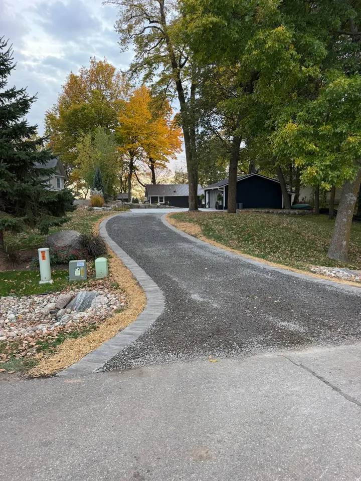 Cabin Landscaping with Boulder Walls, Flagstone Patio, and a New Driveway on Lake Washington, another view